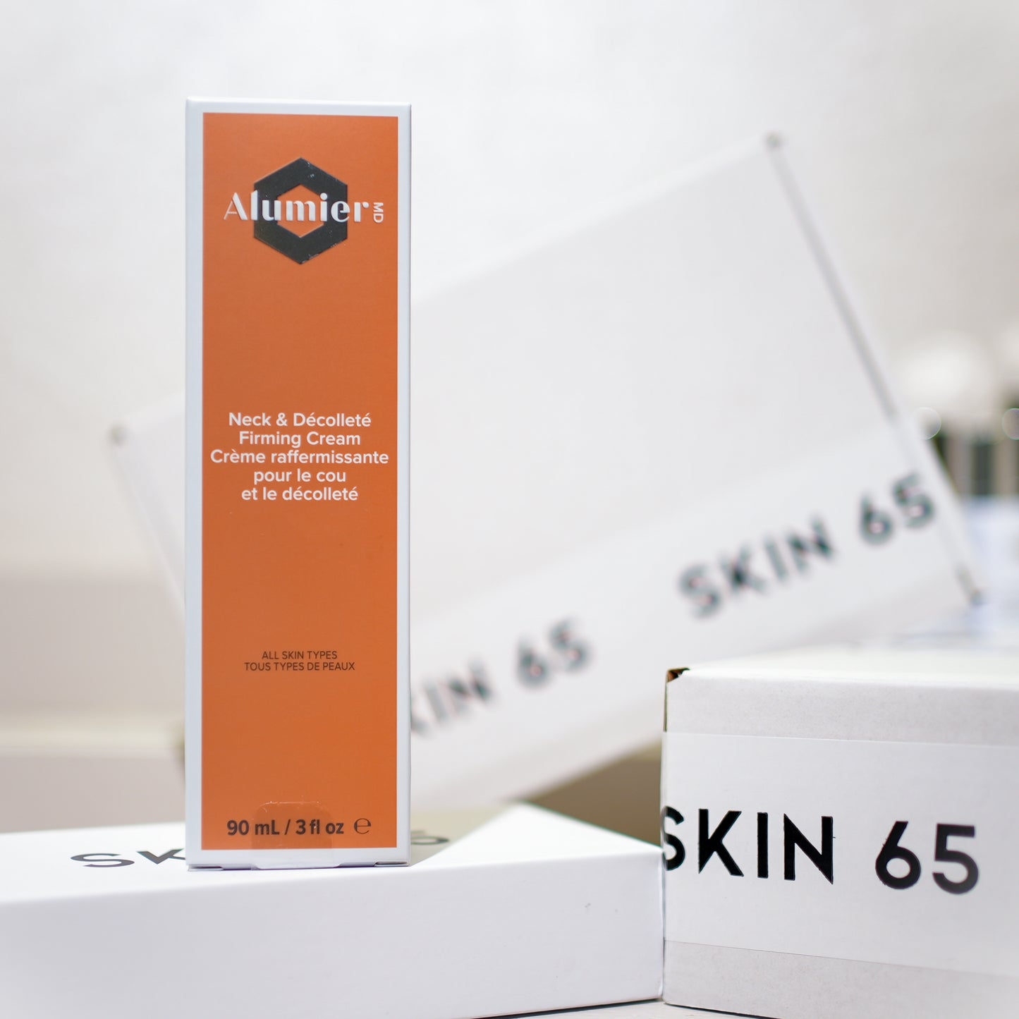 Alumier MD Neck and Décolleté Firming Cream 90ml in the Box with Skin65 Branding
