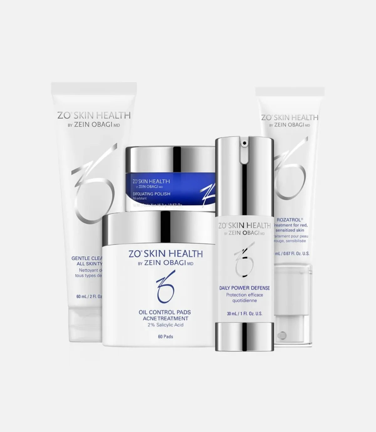 Skincare products including tubes, jars, and a pump bottle labeled "ZO SKIN HEALTH by ZEIN OBAGI MD" in various colors, arranged in front of a plain white background.
Text on image:
- Gentle Cleanser all skin types
- Exfoliating Polish
- Oil Control Pads Acne Treatment 2% Salicylic Acid
- Daily Power Defense
- Rozatrol