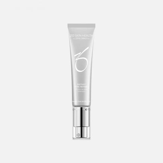 A silver tube labeled "ZO SKIN HEALTH by ZEIN OBAGI MD, INSTANT PORE REFINER" stands upright on a white background. The tube features a pump dispenser at the bottom.