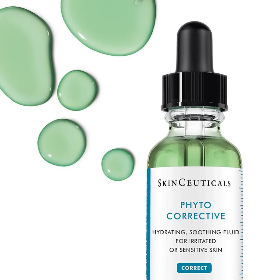 A dropper bottle labeled "Skinceuticals Phyto Corrective, Hydrating, Soothing Fluid for Irritated or Sensitive Skin" with green liquid and droplets beside it against a white background.