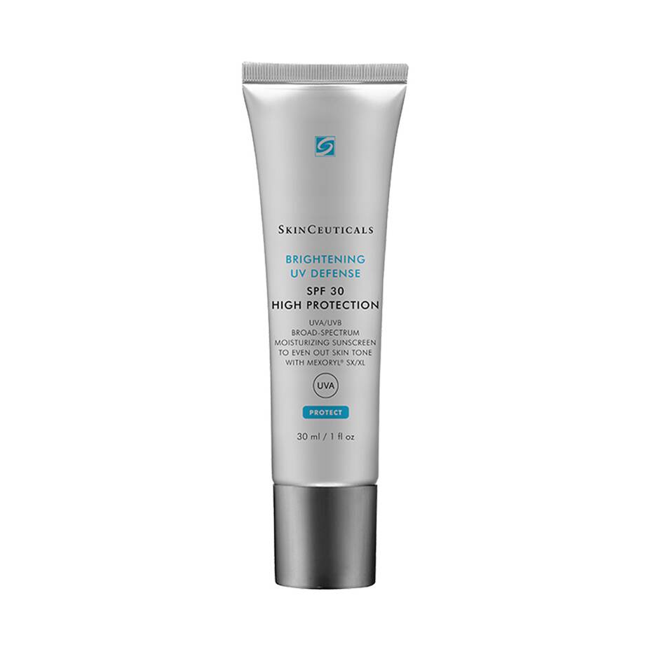 SkinCeuticals Brightening UV Defense SPF 30 Moisturizing Sunscreen in a silver tube with a metallic cap, containing 30 ml (1 fl oz). Text: "Broad-Spectrum Moisturizing Sunscreen to Even Out Skin Tone with MEXORYL SX&XL".