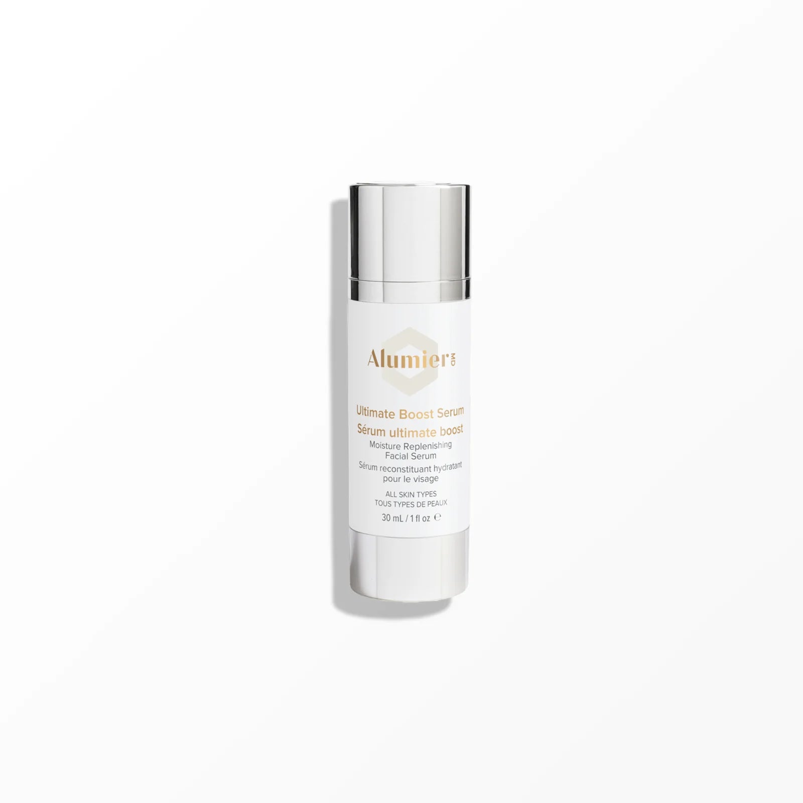 White bottle with a silver cap labeled “AlumierMD Ultimate Boost Serum,” on a white background. The text reads: "Moisture Replenishing Facial Serum. Sérum reconstituant hydratant pour le visage. All skin types. Tous types de peaux. 30 mL / 1 fl oz."