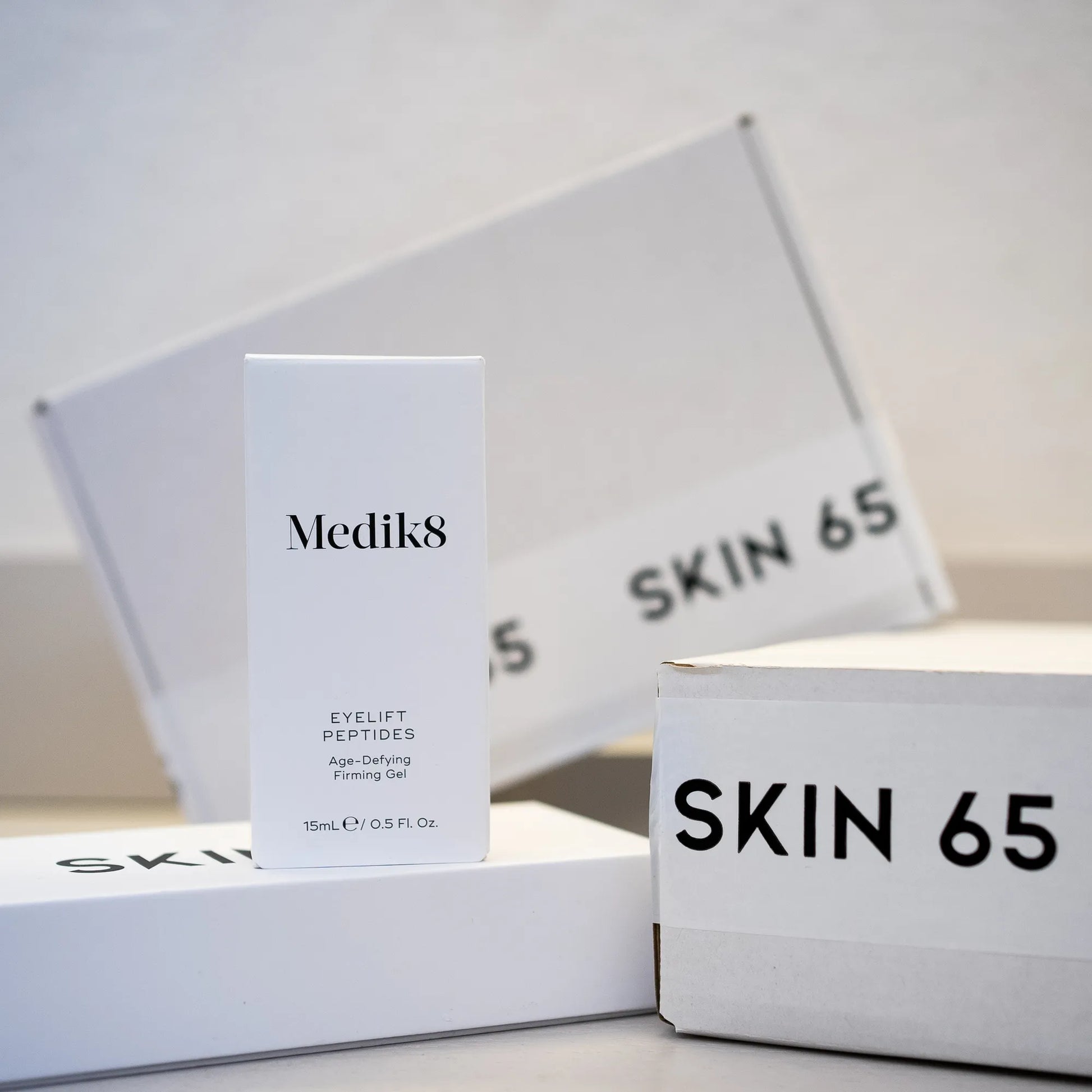 Medik8 Eyelift Peptides 15ml in the Box with Skin65 Branding in the Background