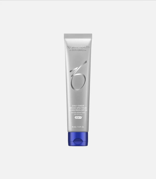 A silver tube labeled "ZO Skin Health" with a blue cap, contains Daily Sheer Broad-Spectrum Sunscreen SPF 50, 45 mL (1.5 fl. oz), placed against a plain white background.