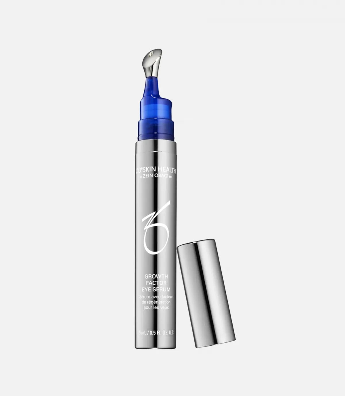 A silver cylindrical tube with a blue applicator tip labeled "ZO® SKIN HEALTH ZEIN OBAGI MD GROWTH FACTOR EYE SERUM" stands upright with its cap removed, against a plain white background.