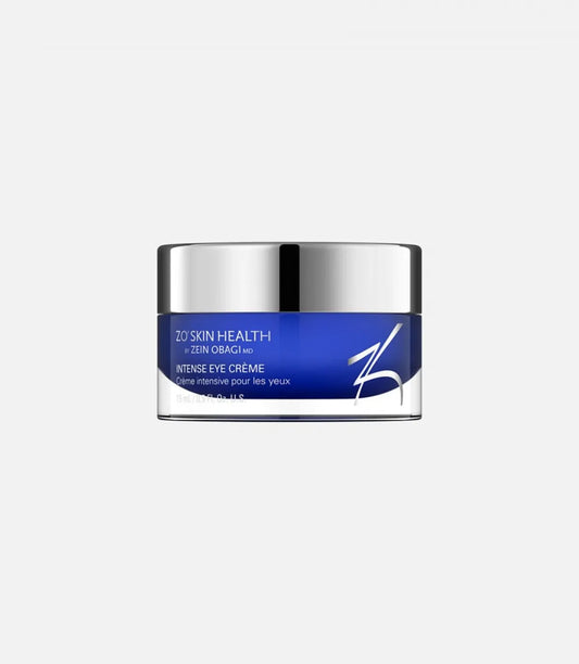 A blue and silver jar labeled "ZO Skin Health by Zein Obagi MD Intense Eye Crème, Crème intensive pour les yeux," sits against a plain white background.