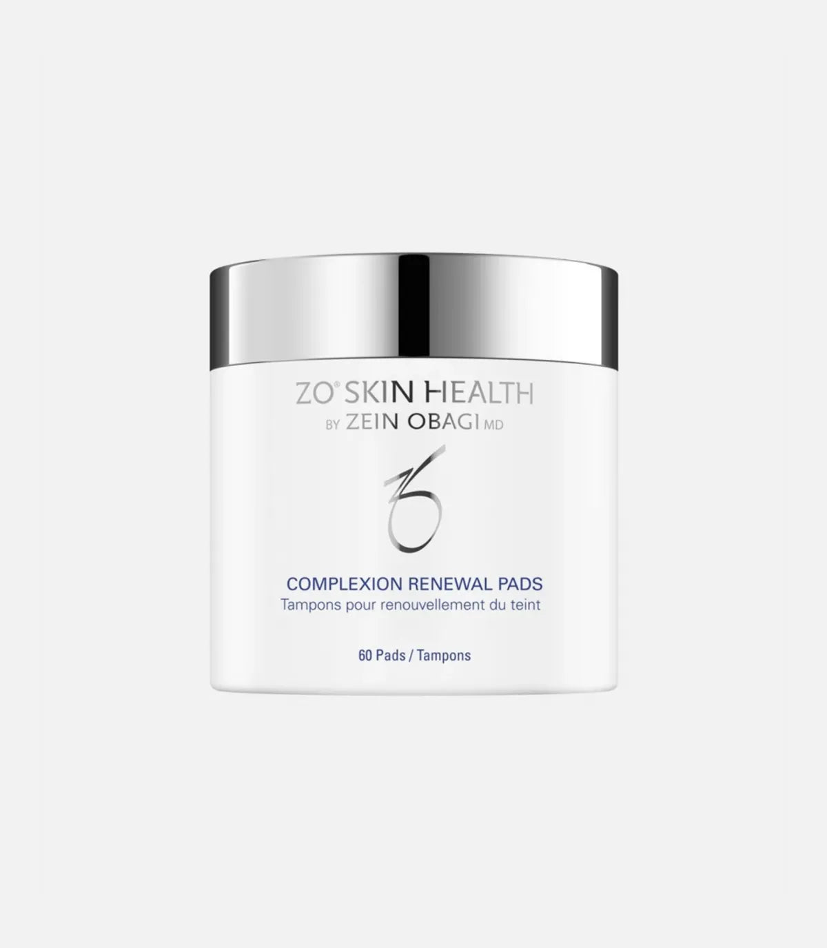 A white container with a shiny silver lid displays the text "ZO® SKIN HEALTH BY ZEIN OBAGI MD COMPLEXION RENEWAL PADS Tampons pour renouvellement du teint 60 Pads/Tampons." The background is plain light gray.