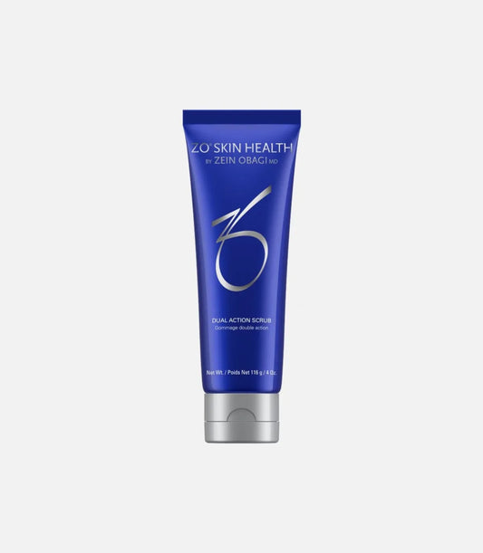 A blue tube labeled "ZO Skin Health by Zein Obagi MD Dual Action Scrub" stands upright against a plain light-gray background. The tube has a silver cap and a minimalist design.