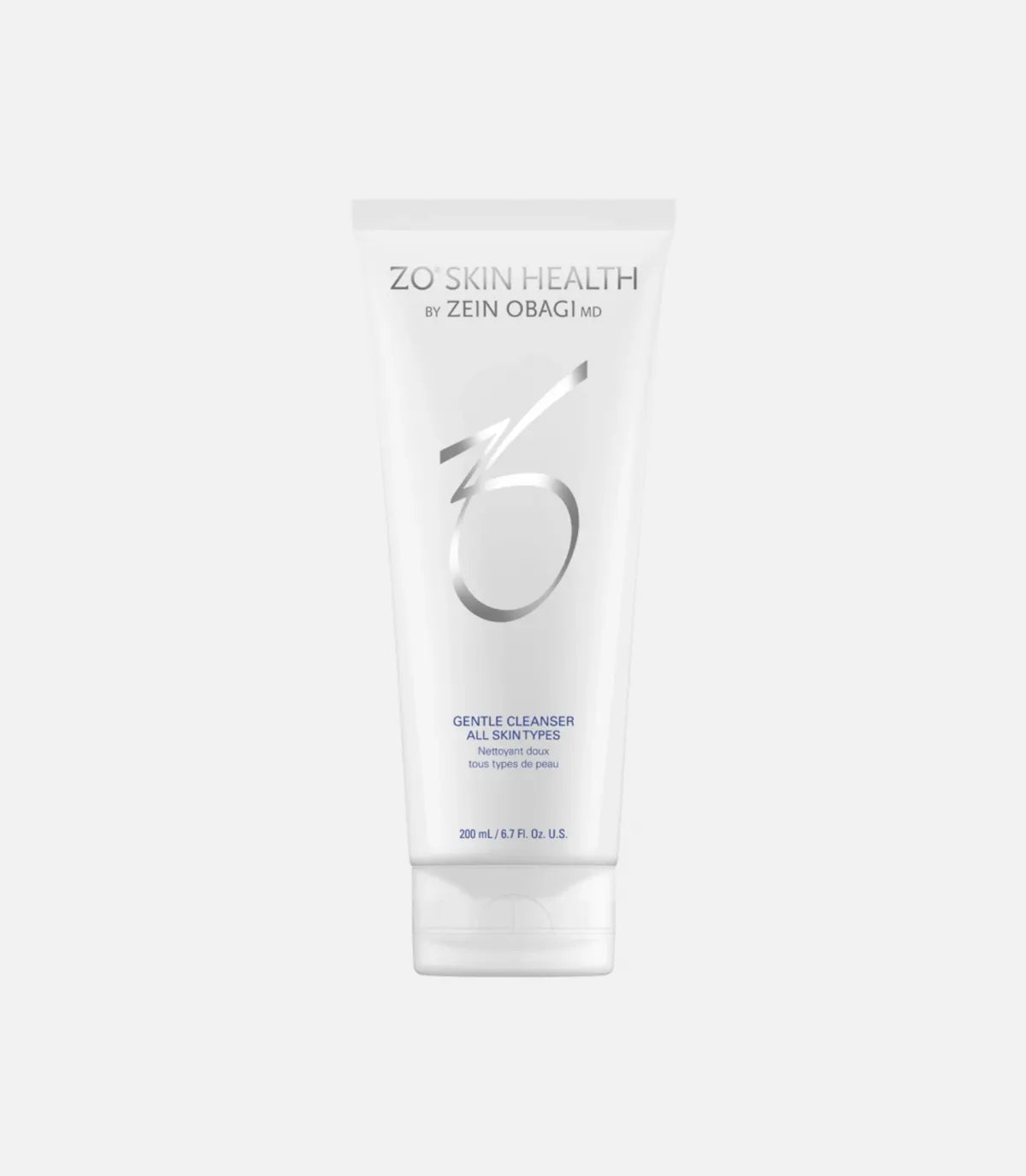 A white tube of ZO Skin Health by Zein Obagi MD, Gentle Cleanser for all skin types, sits against a white background. Text: "200 mL / 6.7 FL. OZ."