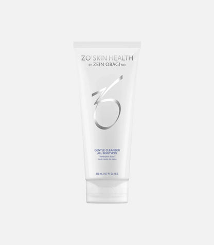 A white tube of ZO Skin Health by Zein Obagi MD, Gentle Cleanser for all skin types, sits against a white background. Text: "200 mL / 6.7 FL. OZ."