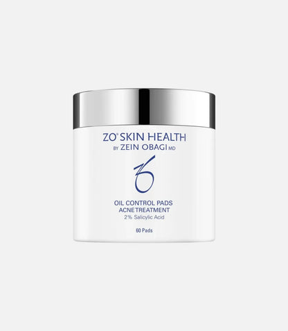 A white container with a silver lid labeled "ZO Skin Health by Zein Obagi MD." It reads "Oil Control Pads Acne Treatment, 2% Salicylic Acid," containing 60 pads. The container sits against a plain background.