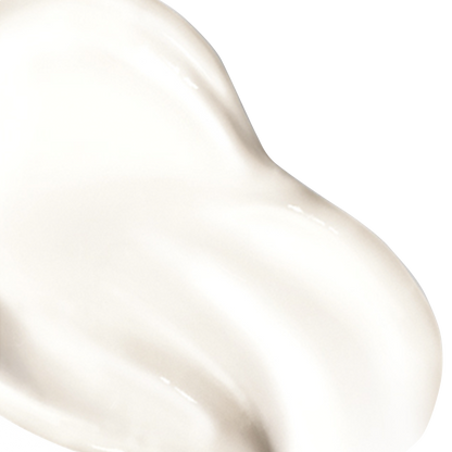 A smooth, creamy white substance with a glistening texture, appears smeared on a plain white background.