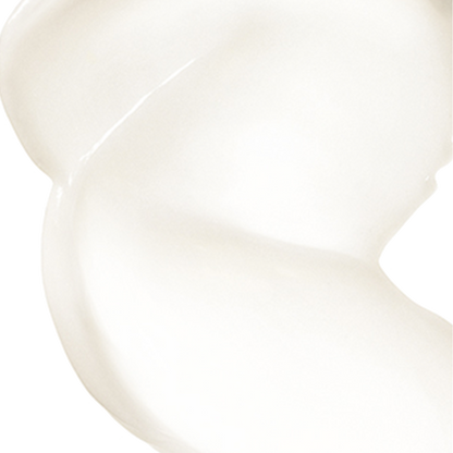 A smooth, creamy swirl of white substance is placed against a plain, white background. The texture appears glossy and thick, consistent with lotion or cream.