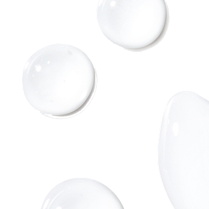 Clear droplets of liquid rest on a white background, with one large droplet and three smaller ones scattered around, reflecting light and creating a minimalist, clean aesthetic.