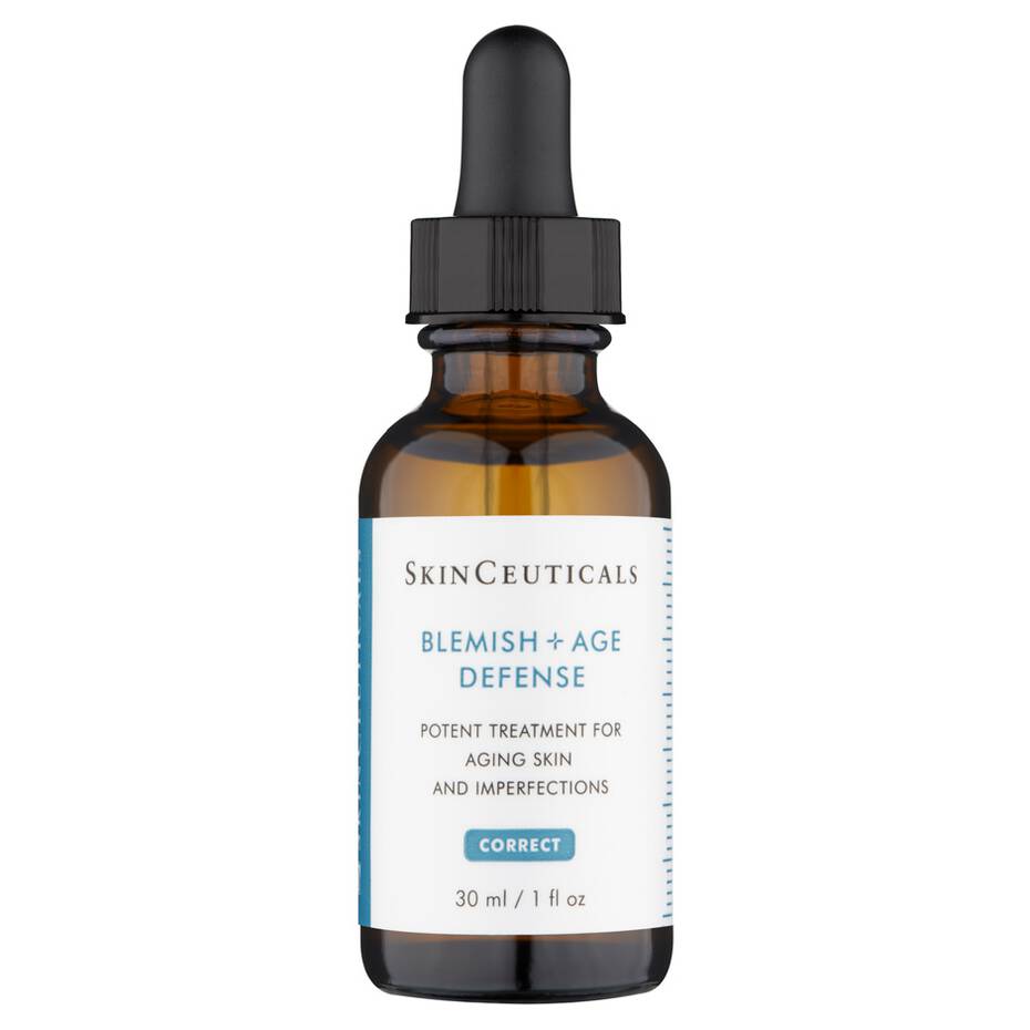 Bottle of SkinCeuticals Blemish + Age Defense serum with a dropper cap against a white background. The label reads: "POTENT TREATMENT FOR AGING SKIN AND IMPERFECTIONS. 30 ml / 1 fl oz."