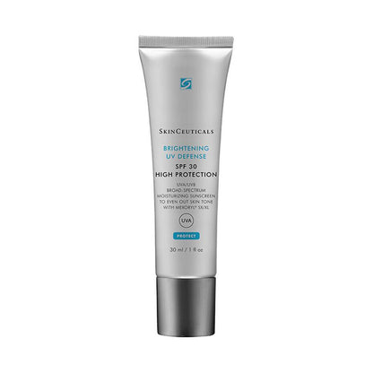 SkinCeuticals Brightening UV Defense SPF 30 Moisturizing Sunscreen in a silver tube with a metallic cap, containing 30 ml (1 fl oz). Text: "Broad-Spectrum Moisturizing Sunscreen to Even Out Skin Tone with MEXORYL SX&XL".