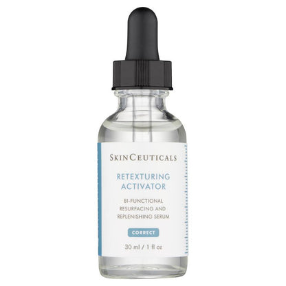 Clear glass bottle with black dropper containing SkinCeuticals Retexturing Activator, a bi-functional resurfacing and replenishing serum labeled "CORRECT," 30 ml / 1 fl oz, placed against a plain backdrop.