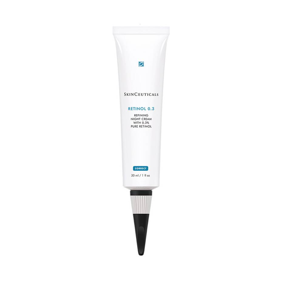 A white tube labeled "SkinCeuticals Retinol 0.3" contains concentrated night cream with pure retinol. The tube features a black cap and text, "Correct, 30 ml / 1 fl oz." Background is plain white.