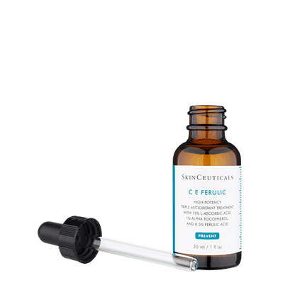 A brown glass dropper bottle labeled "SkinCeuticals CE Ferulic" sits against a white background. The detached dropper lies in front. The text reads:

"SkinCeuticals
C E Ferulic
High potency triple antioxidant treatment with 15% L-ascorbic acid, 1% alpha-tocopherol, and 0.5% ferulic acid.
PREVENT
30 ml / 1 fl oz"